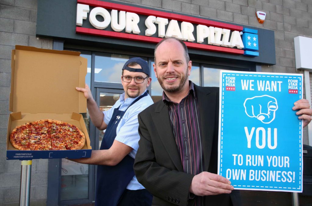 Four Star Pizza Director Brian Clarke (right) with Bangor store assistant manager Matt Tennant